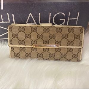 Authentic Gucci long monogram metal clasp wallet